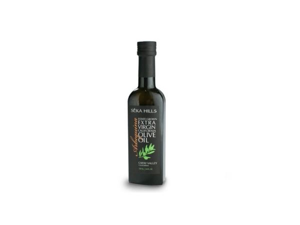bottle of olive oil with white background