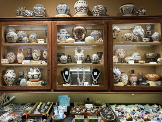 MONAH's display case and shelves of dozens of Native American pottery and artwork