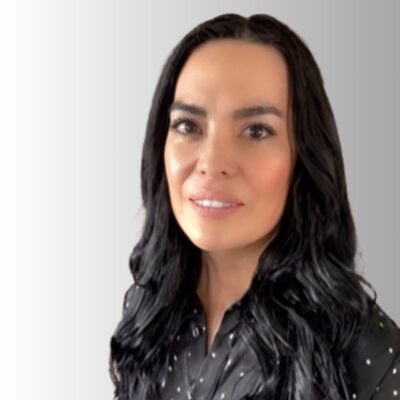 Headshot of woman with black hair and a black shirt